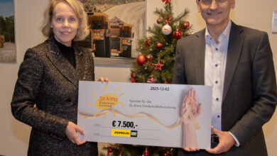 Spendenübergabe (v.l.): Lisa Huto (St. Anna Kinderebsforschung) und Zeppelin Österreich-Geschäftsführer Michael Härtel. Copyright: Zeppelin Österreich